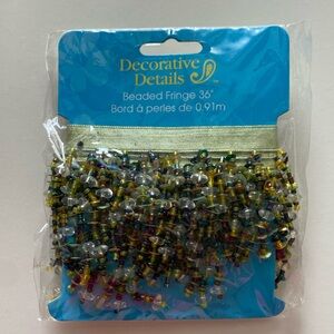 Green decorative beaded fringe for crafts or art projects